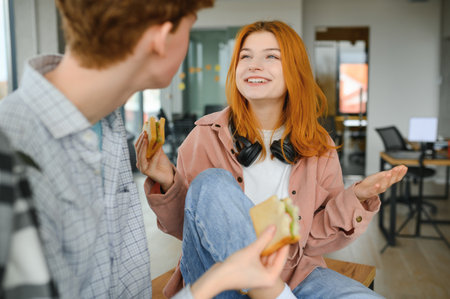 Happy high school students in the classroom.の写真素材