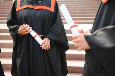 Close up people progressed with diplomas.の写真素材
