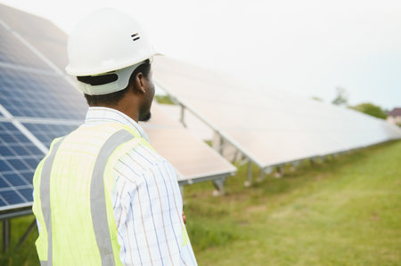 Man, engineer and solar panel on a farm for renewable energy, sustainability and eco environment.