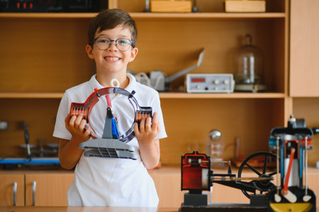 Physics lesson. A student at a desk with scientific instruments and a telescope.