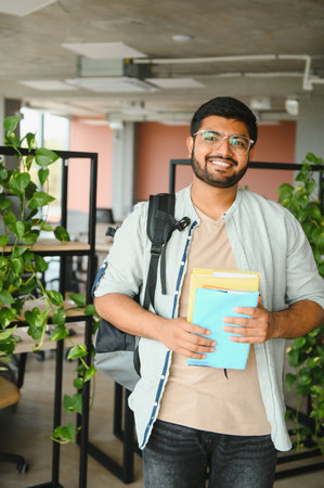 Happy Indian male student at the university.の写真素材