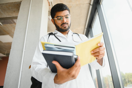 Portrait of a young doctor student studying.の写真素材
