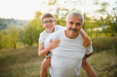 loving grandfather and little grandson best friends.の写真素材