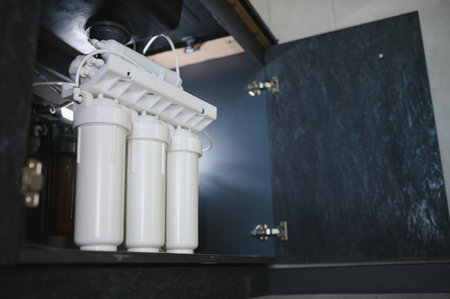 Reverse osmosis water purification system at home. Installed water purification filters. Clear water...