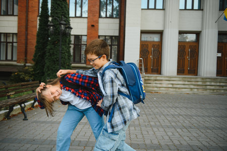 Portrait of smiling school kids standing at school yard.の写真素材