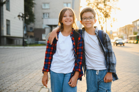 Portrait of smiling school kids standing at school yard.の写真素材