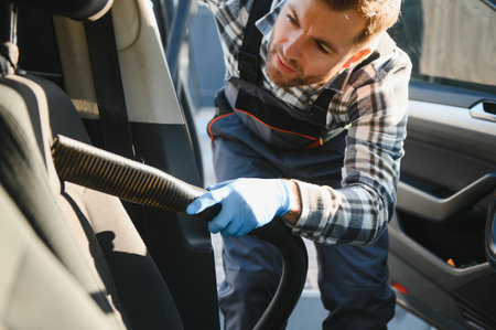 Portrait of a man while sitting inside a customer vehicle.の写真素材