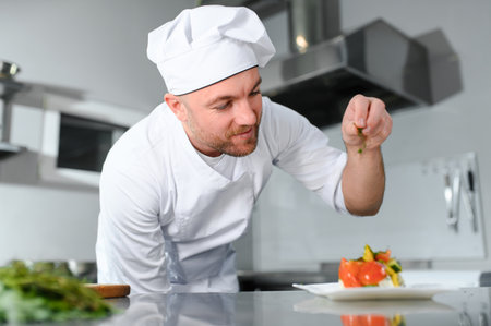 Professional Chef Working in a Famous Restaurant Kitchen.の写真素材