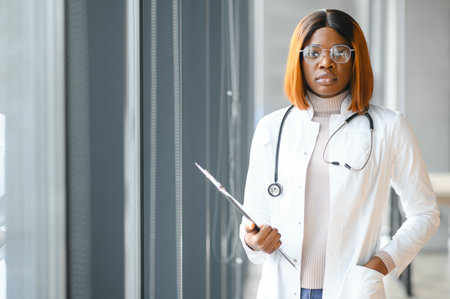 Medical Doctor Indoors Portraits. Portrait of a confident doctor working at a hospital.の写真素材