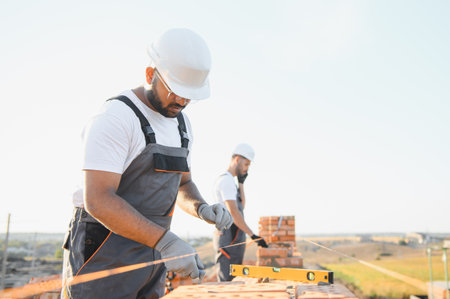 Group of Indian workers at a construction site.の写真素材