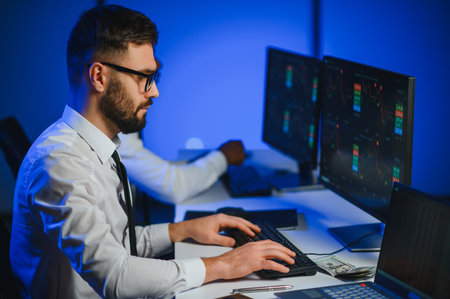 Crypto trader investor analyst looking at computer screen analyzing financial graph data on pc...