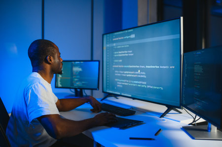 IT Programmer Working on Desktop Computer. Male Specialist Creating Innovative Software Engineer...