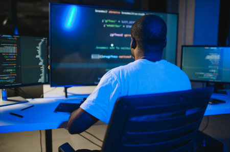 photo of smart skilled introvert tester write typing operating data security evening office dark...