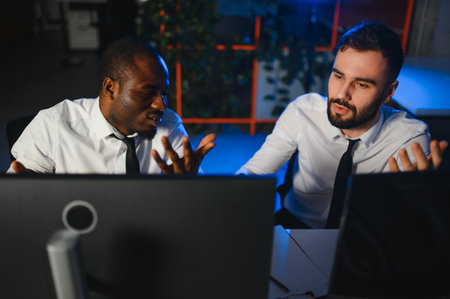 Team of traders working with forex trading charts and graphs on computer screen.の写真素材