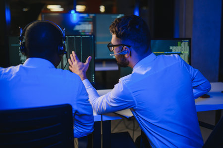 Happy Confident Technical Customer Support Specialist Having a Headset Call in a Monitoring and...