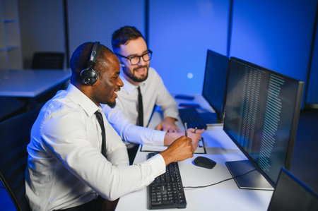 Young male technical support dispatcher in call center.の写真素材