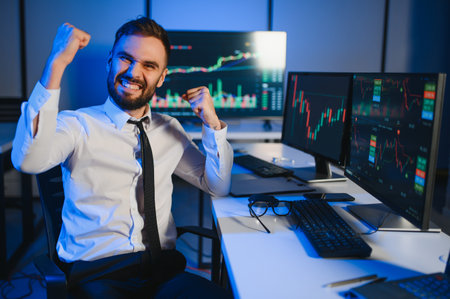 Joyful business investor happy with good exchange of bitcoin at online stock platform feeling delight.の写真素材