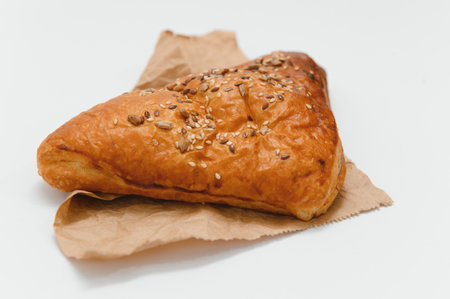 Puff pastry triangle on white background.の写真素材