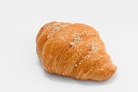 fresh baked croissant isolated on white background.の写真素材