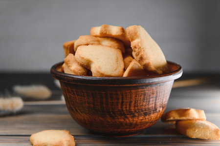 butter cookies isolated on a wooden background.の写真素材