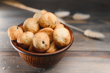 Fresh pastries. Delicious cookies on a wooden background.の写真素材
