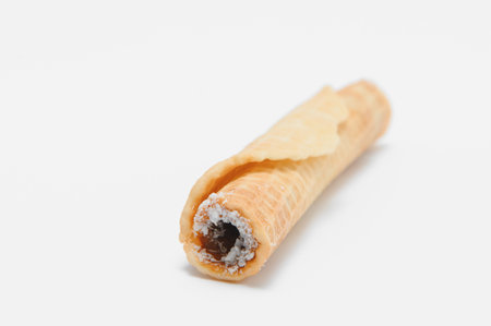 Delicious wafer rolls with boiled condensed milk isolated on white background.の写真素材