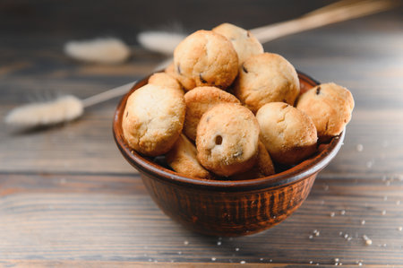 Fresh pastries. Delicious cookies on a wooden background.の写真素材