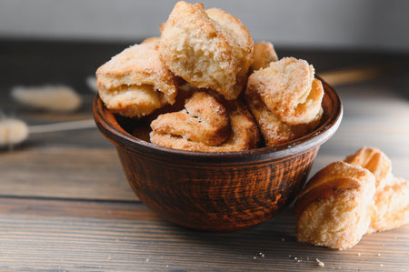 Fresh pastries. Delicious cookies on a wooden background.