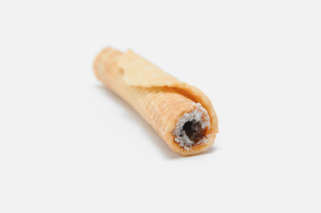 Delicious wafer rolls with boiled condensed milk isolated on white background.の写真素材