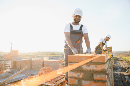 Group of Indian workers at a construction site.の写真素材