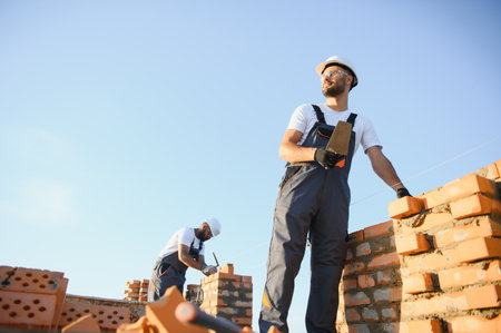 The construction team is building the office center building.の写真素材