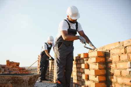 Group of workers at a construction site.の写真素材