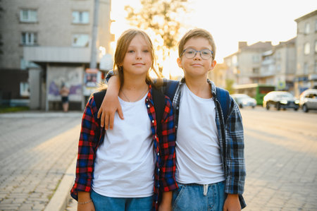 Portrait of smiling school kids standing at school yard.の写真素材
