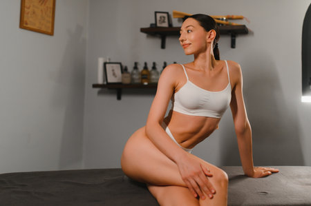 Massage and body care. Spa body massage treatment. Woman having massage in the spa salon. Massage woman hands.の写真素材