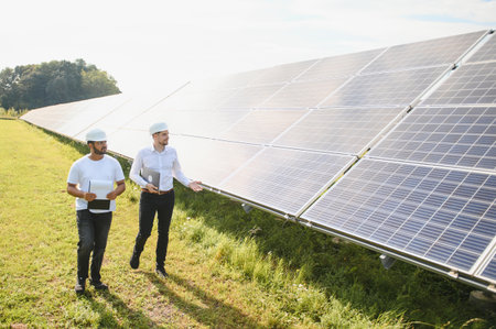 Indian engineer and businessman planning new ecology project. around solar panel roof.の写真素材