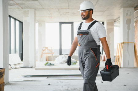 moving, repair and people concept - happy smiling worker.