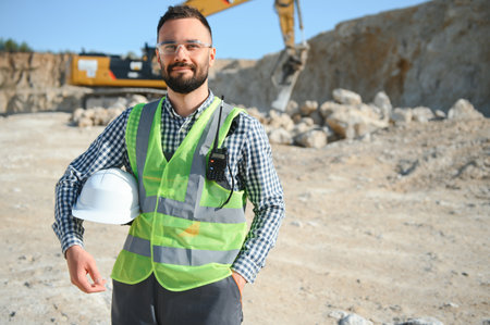 Male worker in sand quarry.