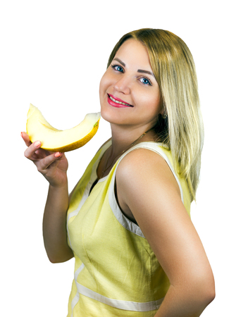 young girl with fruit in their hands isolatedの写真素材