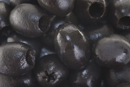 Abstract background:  black  whole olives. の写真素材