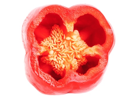 Red paprika (pepper) sliced isolated on a white background 