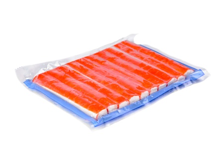 Crab of the stick in packing on white backの写真素材