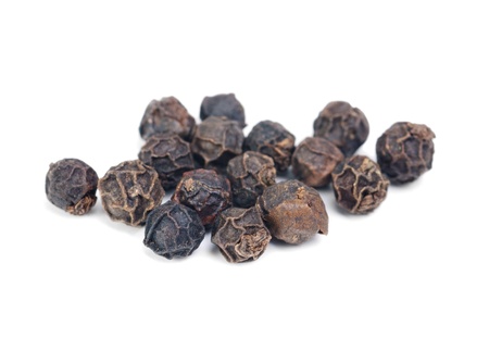black pepper macro isolated on  white  backgroundの写真素材