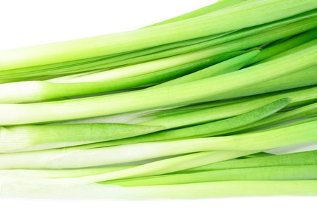 fresh green onions isolated on white の写真素材