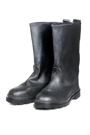 Working or military man's boots black isolated on a white 


