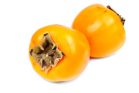Persimmon fruit slice on white backgroundの写真素材