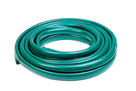hose for watering isolated on a white backgroundの写真素材