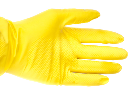 yellow rubber gloves isolated on white backgroundの写真素材