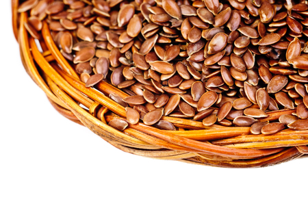 macro flax seeds isolated on white  backgroundの写真素材