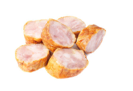 sausage slices on a white backgroundの写真素材