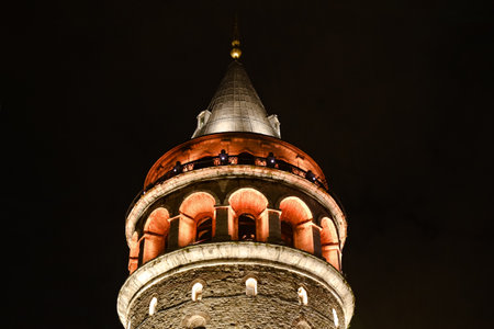 Galata Tower in istanbul at night view.  The tower has an external diameter of 16.45 meters at the base, an 8.95 meters diameter inside, and walls that are 3.75 meters thickのeditorial素材